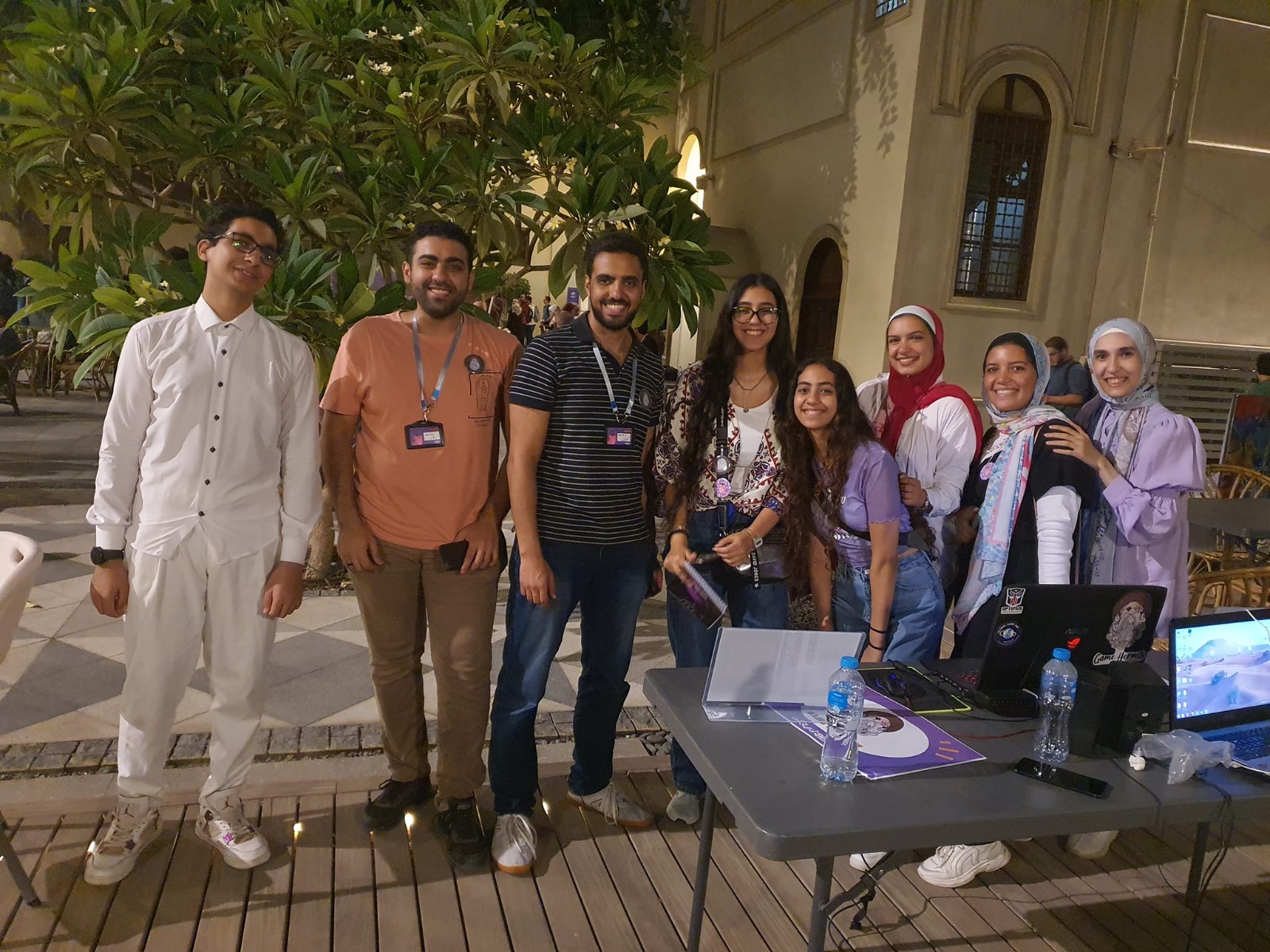 Young Egyptian game developers at an outdoor community event